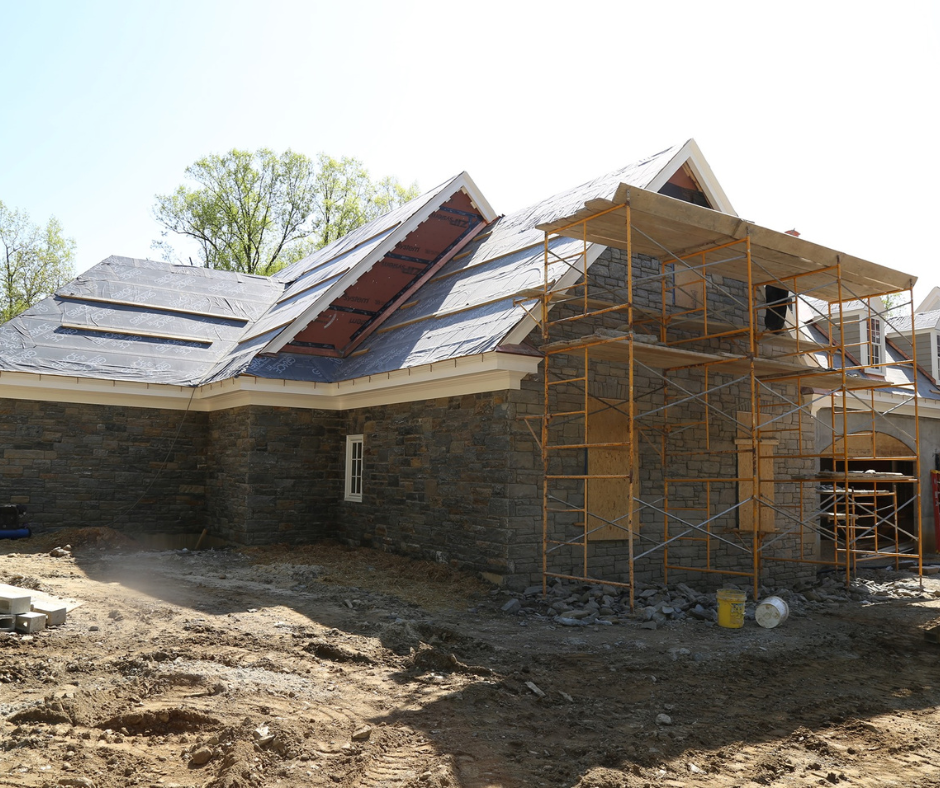 stone building with scaffolding