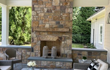 outdoor stone fireplace on patio