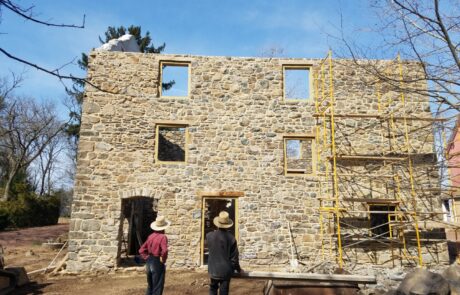 stone wall with window openings construction