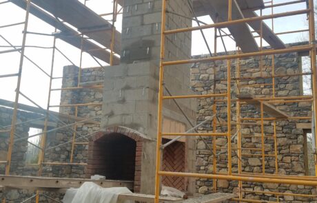 chimney under construction with scaffolding