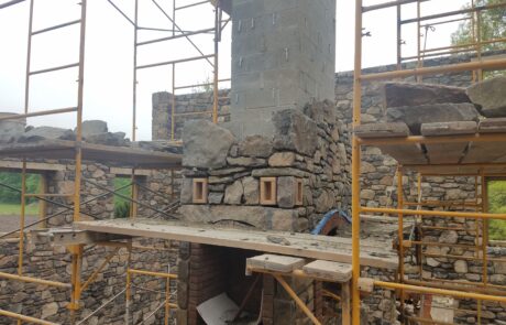 stone chimney under construction