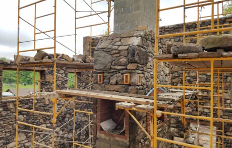 stone chimney under construction